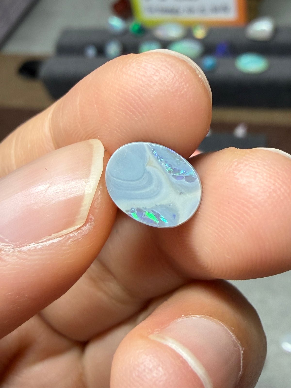 37. “Embrace” dark Opal lightning ridge-1.2ct