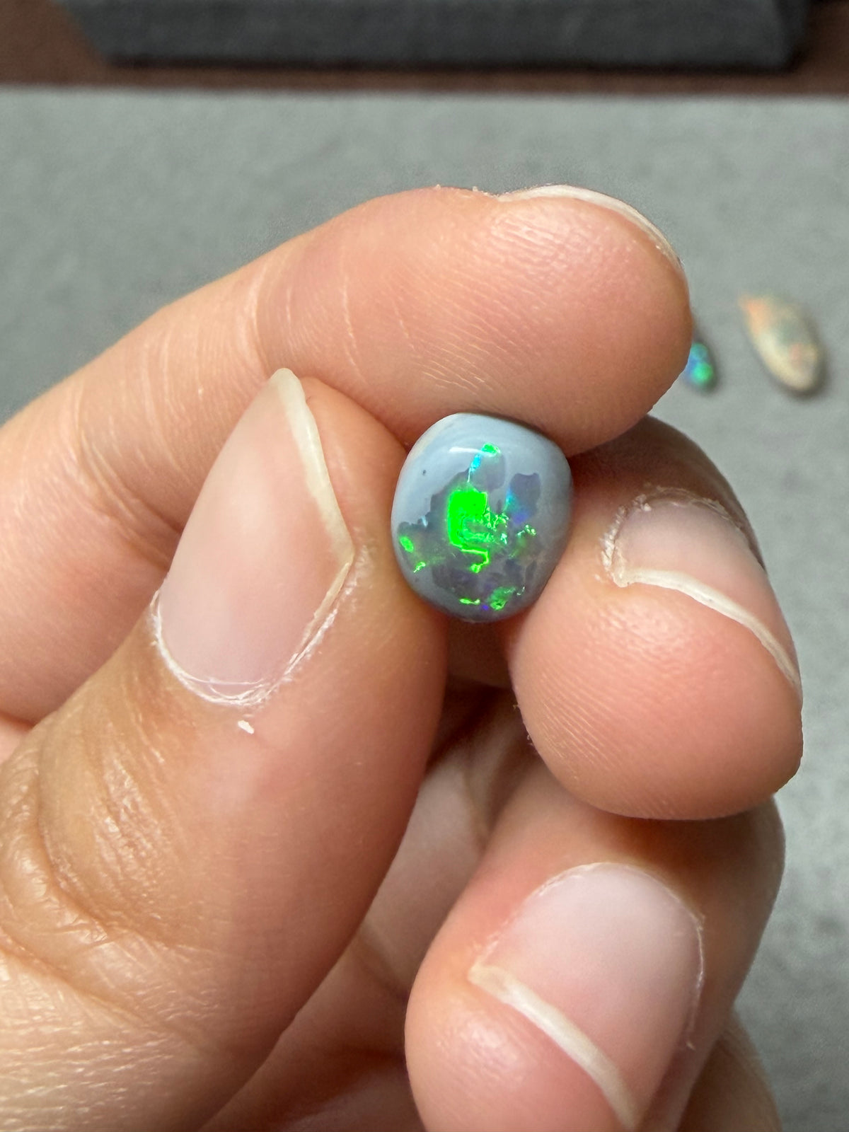 37. “Embrace” dark Opal lightning ridge-1.2ct