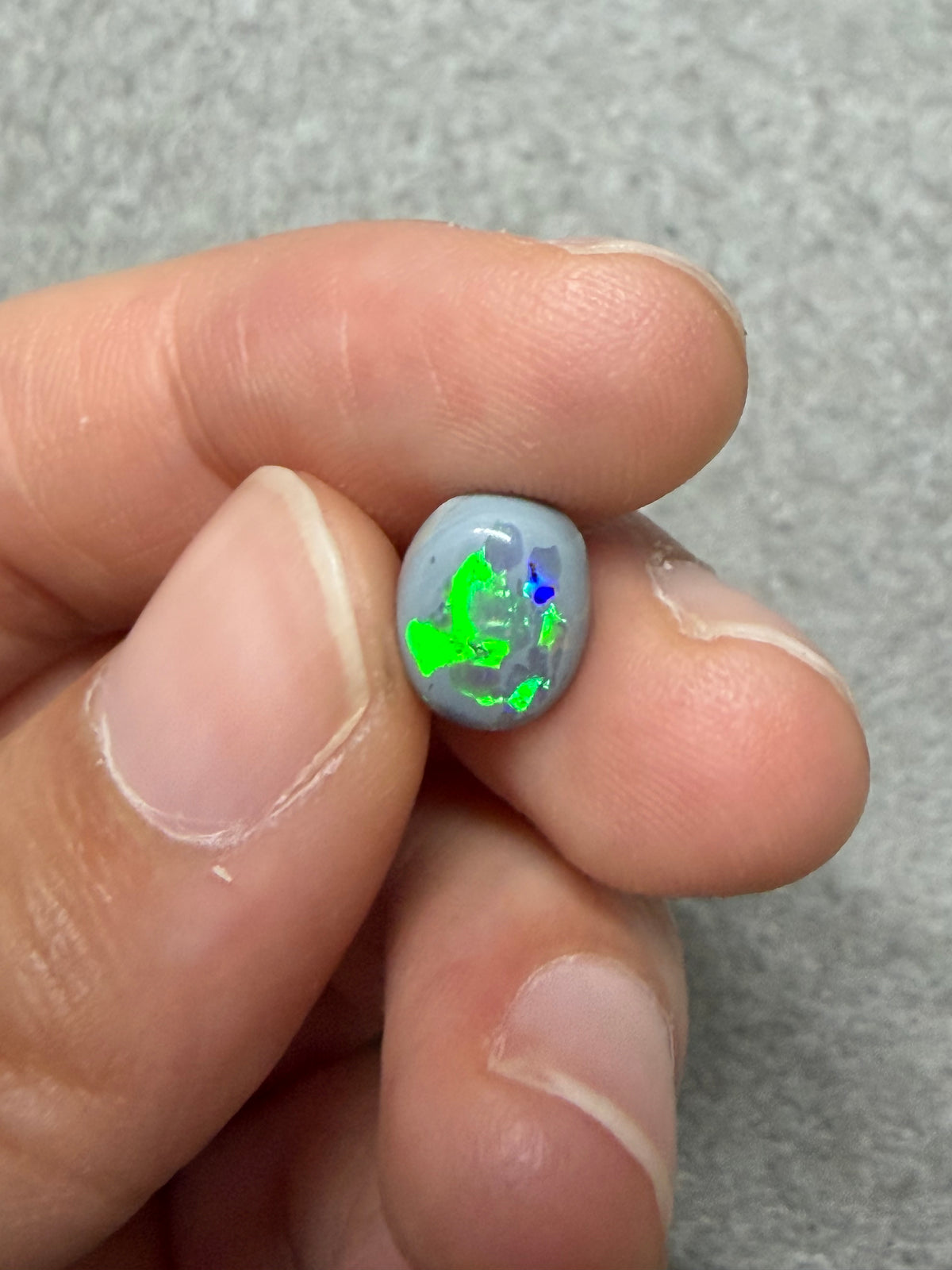 37. “Embrace” dark Opal lightning ridge-1.2ct