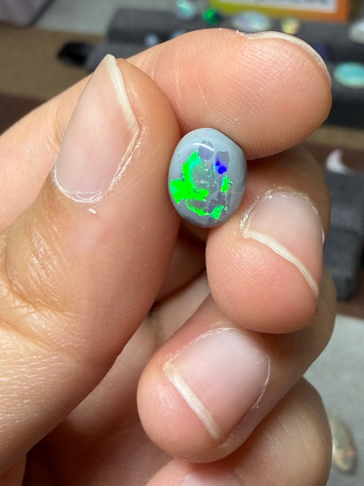 37. “Embrace” dark Opal lightning ridge-1.2ct