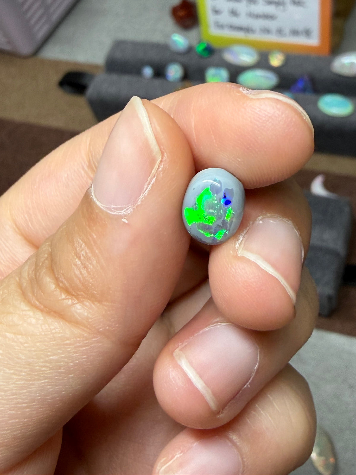 37. “Embrace” dark Opal lightning ridge-1.2ct