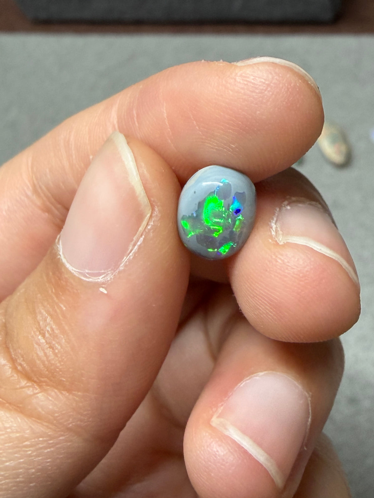 37. “Embrace” dark Opal lightning ridge-1.2ct