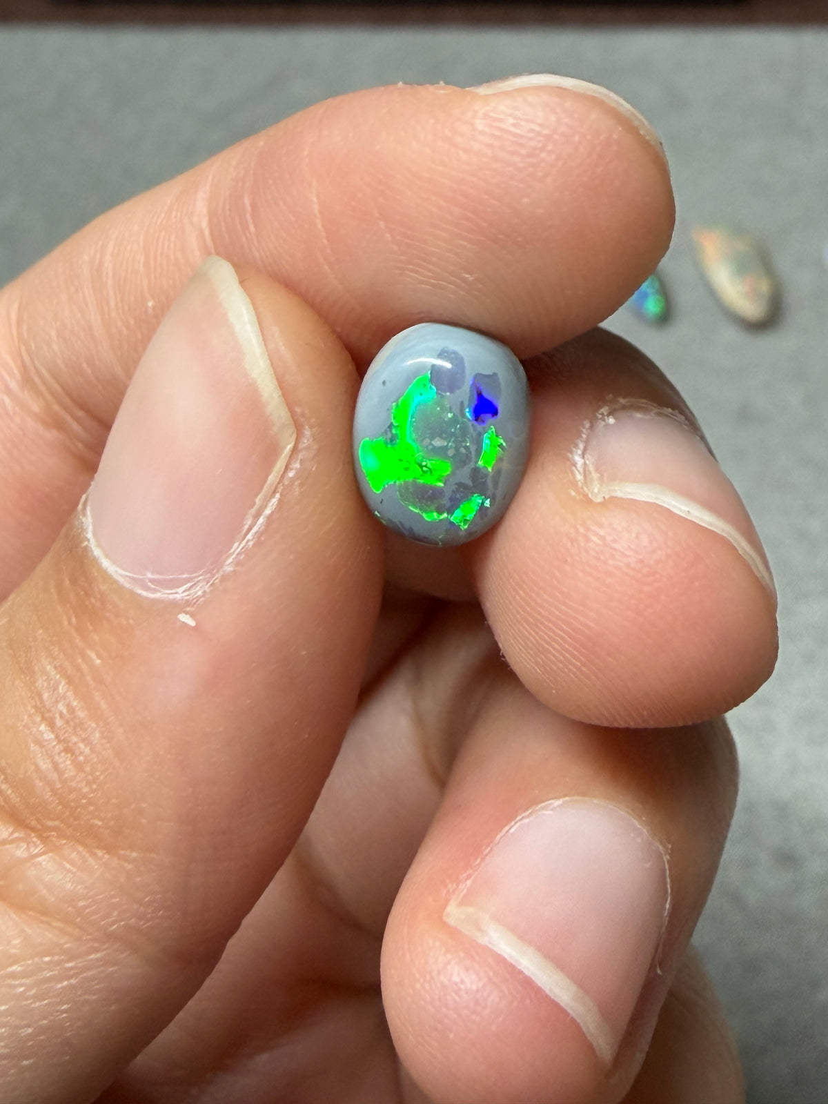 37. “Embrace” dark Opal lightning ridge-1.2ct